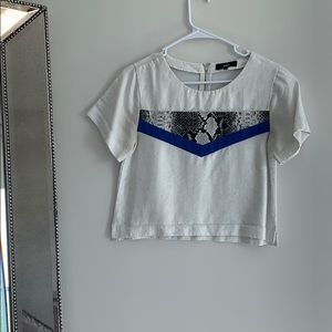 White blouse with a beautiful snake print design!